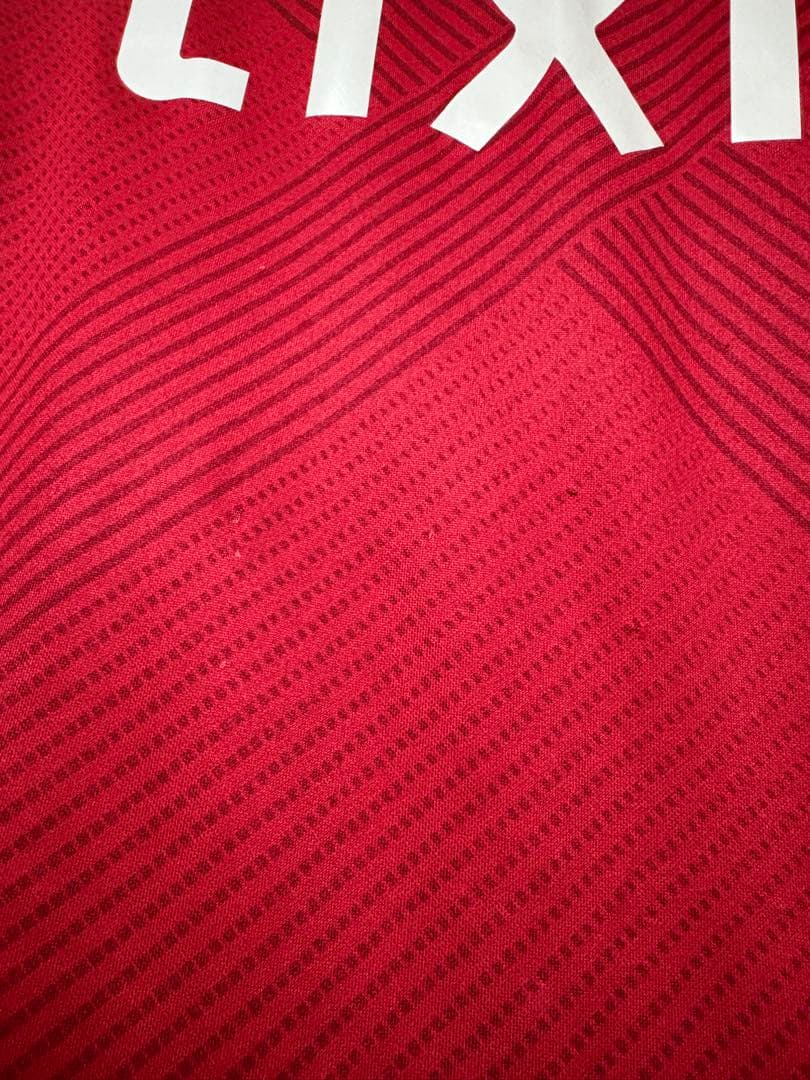アントラーズユニフォームNike 子供用サッカーシャツ 赤 LIXIL
