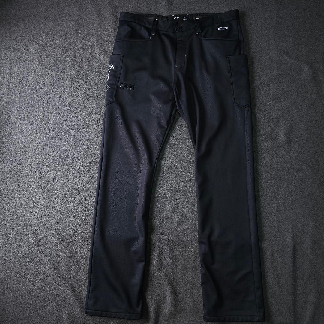 希少W38 4L相当 オークリーゴルフ ストレッチゴルフパンツ 黒 スカルロゴ